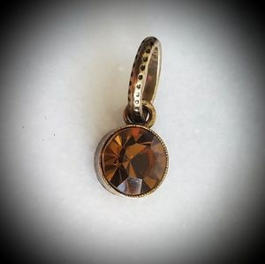 🏵 TOPAZ & BRASS CHARM